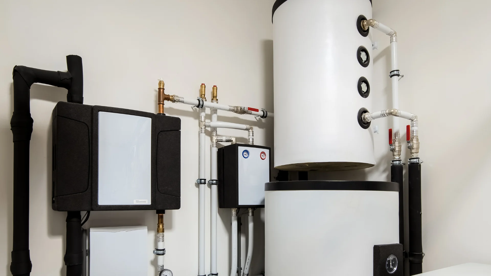 Wall-mounted boiler with connected heating pipework